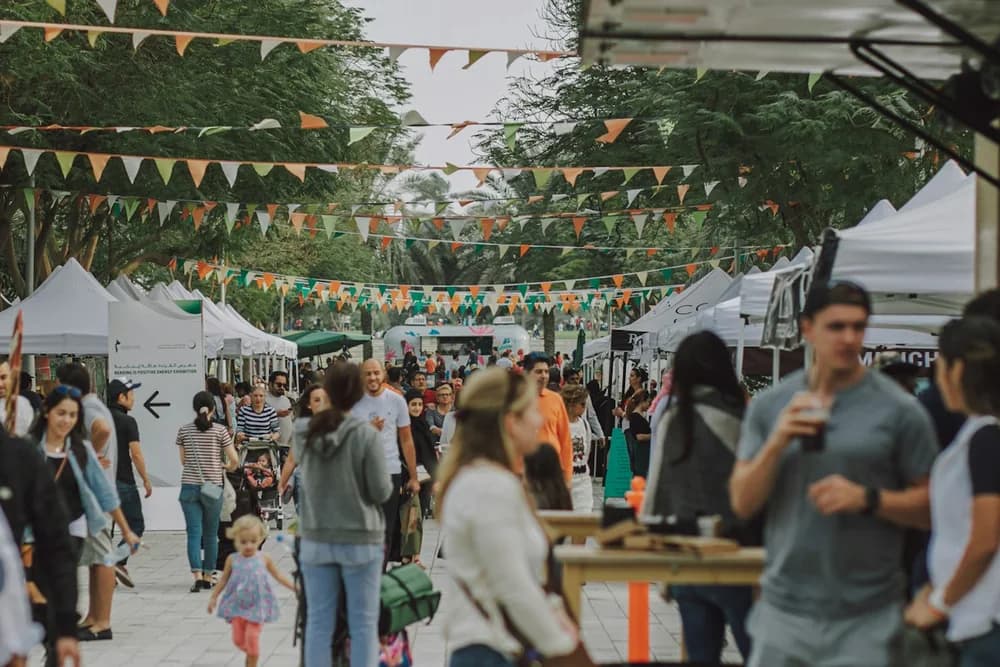 Visitors exploring an outdoor street market